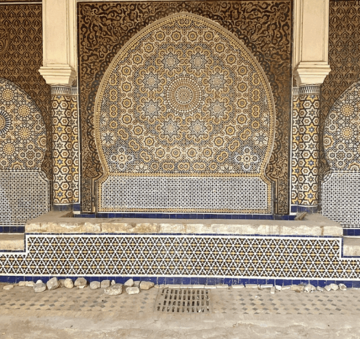 Travelers departing Fes on a scenic Merzouga desert tour through the Atlas Mountains