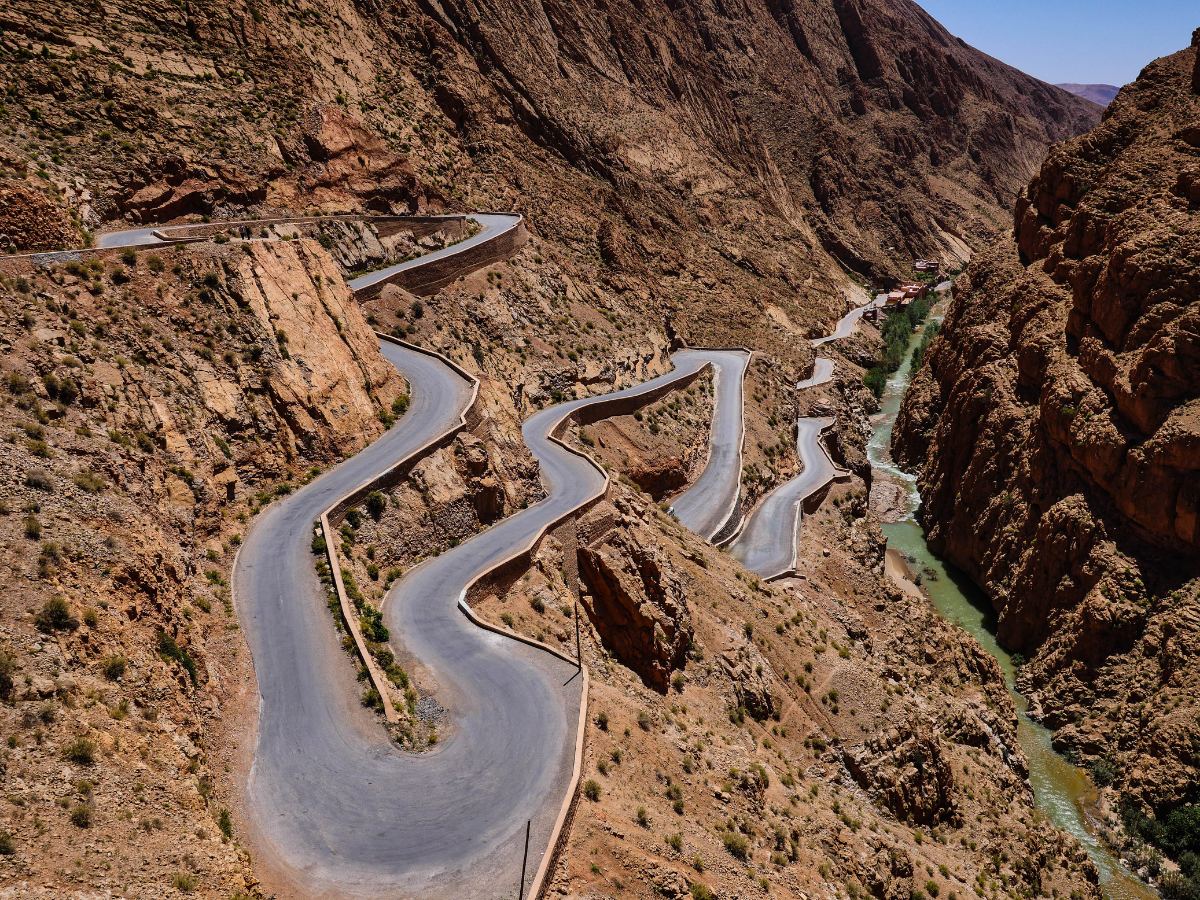 Morocco travel packages 2026 displayed on a laptop at a Marrakech travel agency